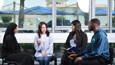 Group of students having conversation with a counsellor