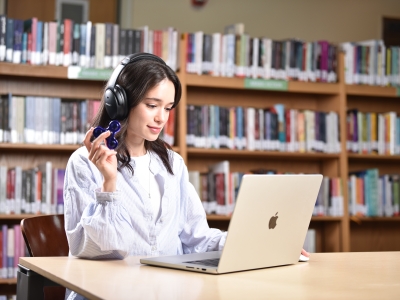 Image of a student using Assistive Technology