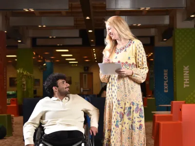 Student on a wheelchair with accessibility services head