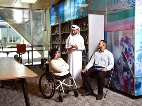 Accessibility Services Specialist having Conversation with Students