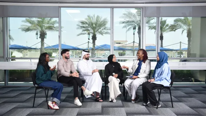 Group of students having conversation with a counsellor