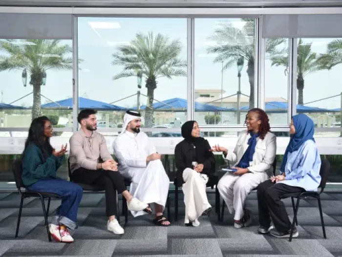 Group of students having conversation with a counsellor