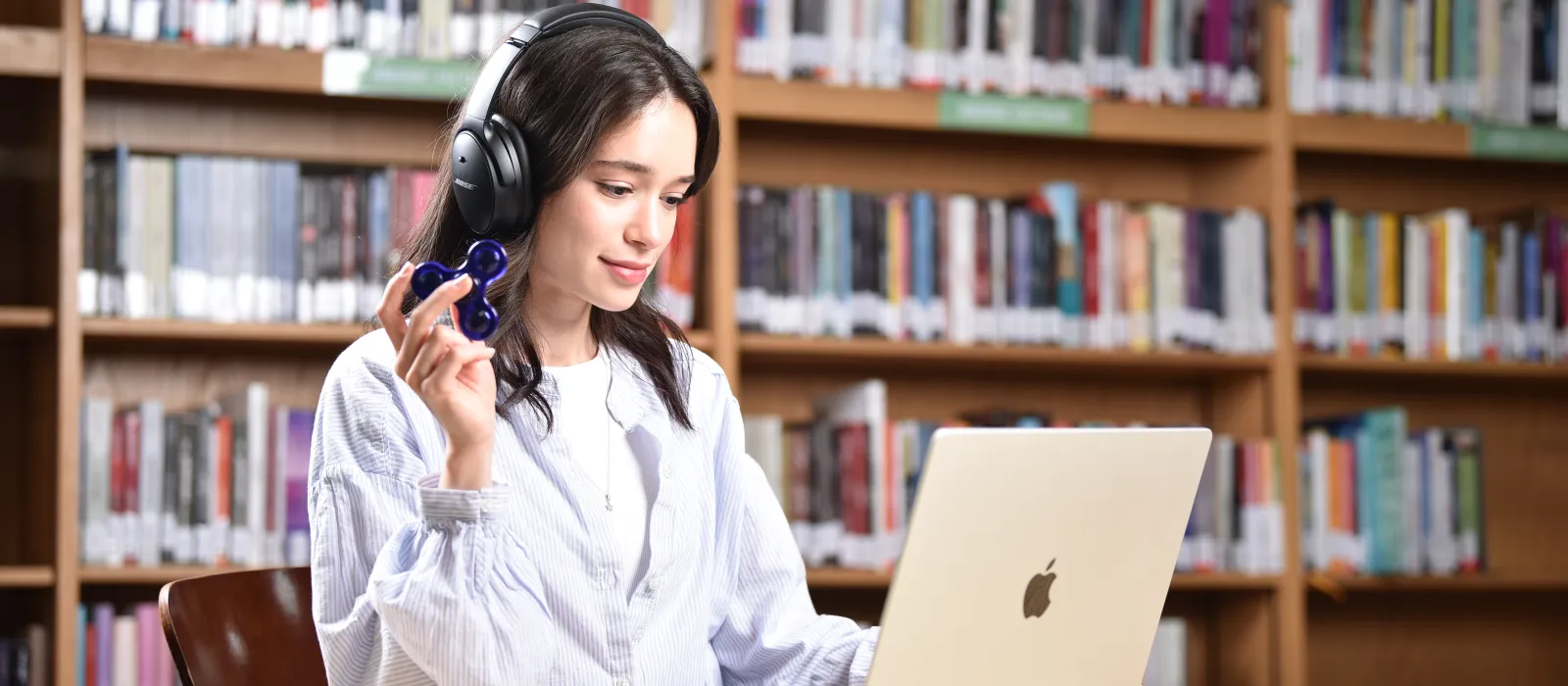 Image of a student using Assistive Technology